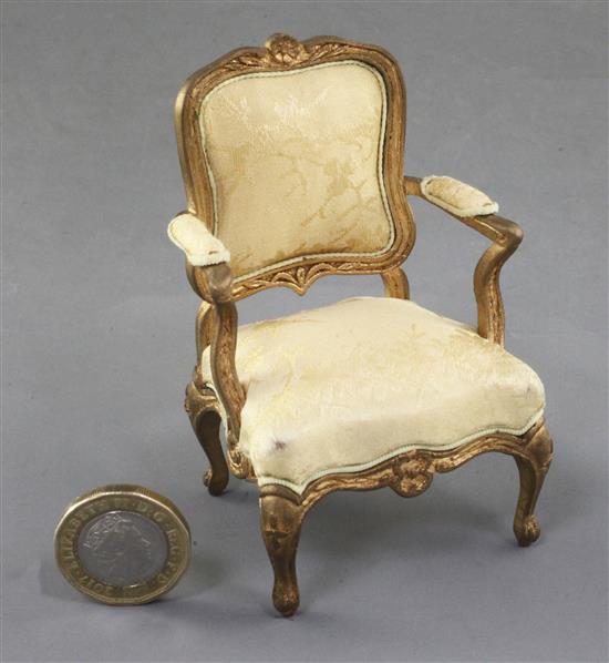 Denis Hillman. A Louis XV style gilt carved wood miniature fauteuil, height 3.75in.